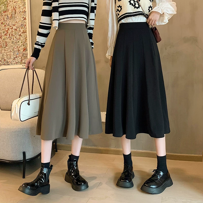 Váy dài vừa che hông cỡ lớn dành cho nữ, váy dù lưng cao thu đông 2023, váy nửa thân, váy chữ A siêu thịnh hành, váy xòe thon gọn.