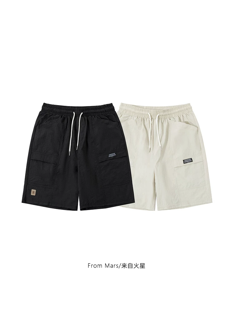 Từ sao Hỏa Mùa hè mát mẻ Phong cách Nhật Bản Thời trang màu trơn Thiết kế túi lớn Quần short rộng rãi đa năng