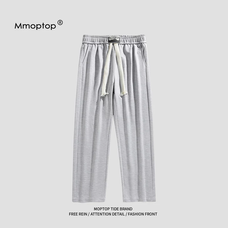 Mmoptop2025 mùa xuân mới quần thể thao ống rộng ống rộng có dây rút nam quần dài dáng rộng giản dị hợp thời trang cho nam