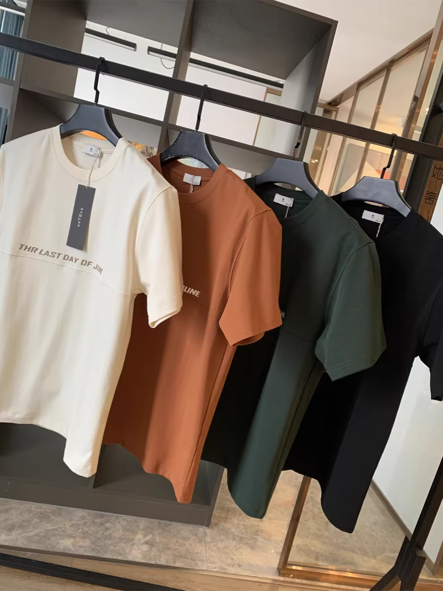 Đặt hàng thương hiệu thời trang Don Quixote! Chất liệu cotton mềm mại thân thiện với da! Áo thun nam ngắn tay in chữ màu trơn mùa hè.