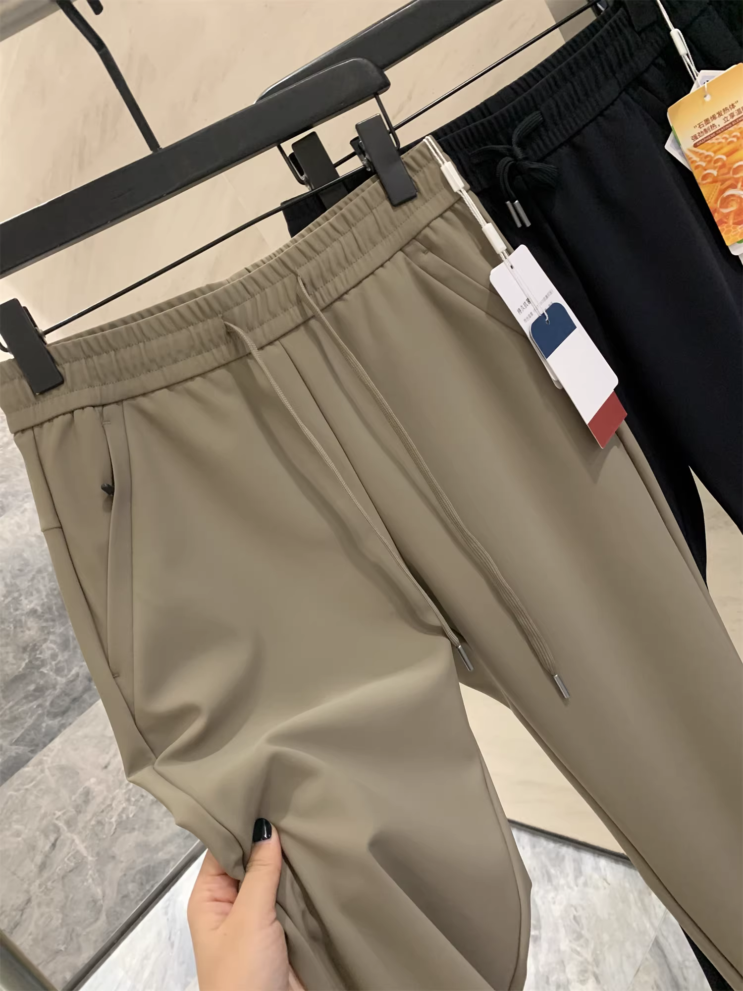 Công nghệ chống nhăn thoáng khí Don Quixote! Quần dài nam mùa thu mới, chất liệu thun co giãn, màu trơn, đa năng, phong cách thường ngày