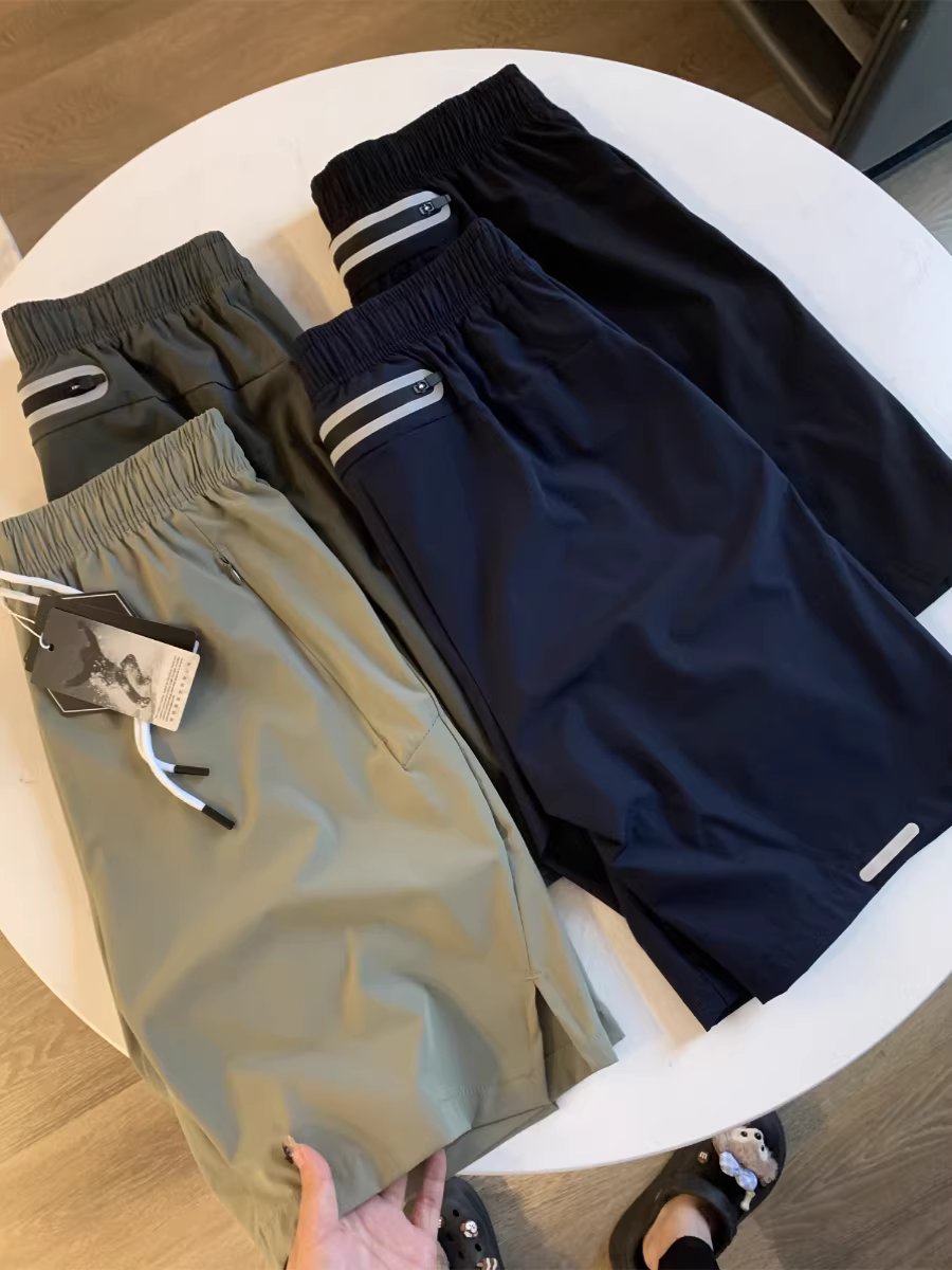 Sản phẩm thể thao ngoài trời Don Quixote! Khóa kéo dính 3M! Quần short thể thao chạy bộ nam thông thường