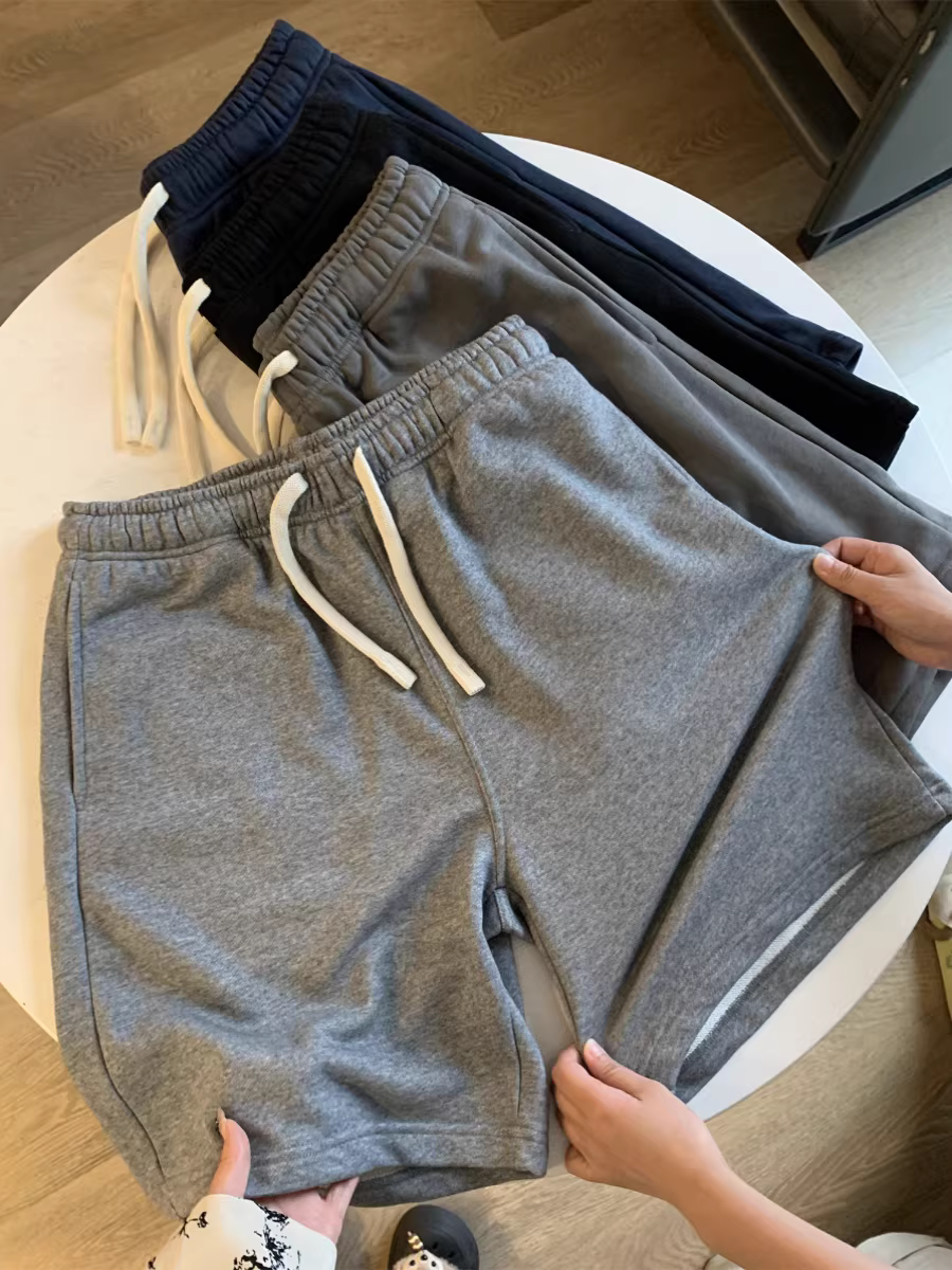 Don Quixote, nặng quá! Quần short thể thao nam mùa hè chất liệu vải thun gân, màu trơn, kiểu dáng năng động.