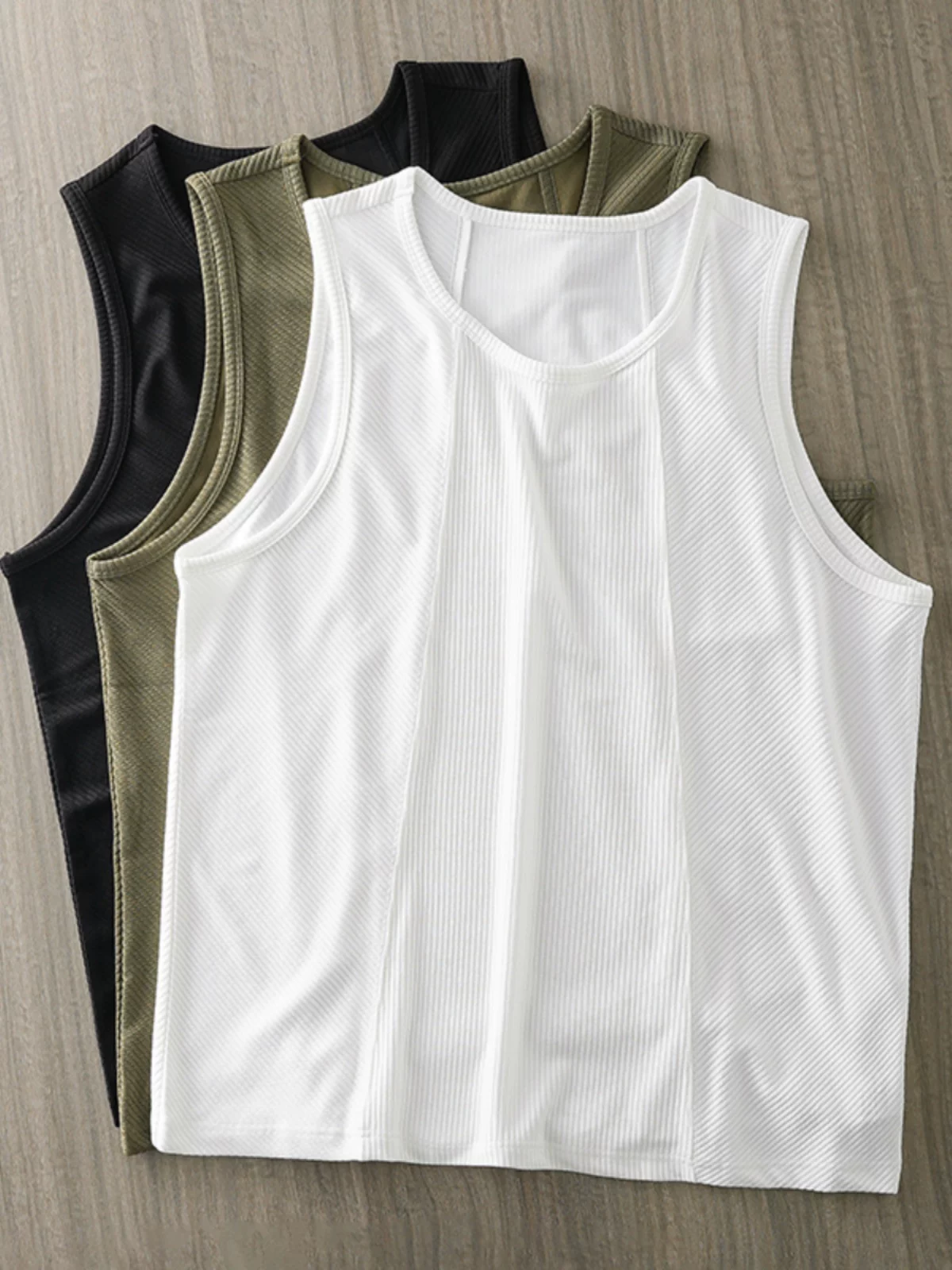 Áo ba lỗ sọc dọc kiểu Mỹ OMZM dành cho nam, áo thun thể thao không tay mới mùa hè 2025, áo lót rộng rãi.