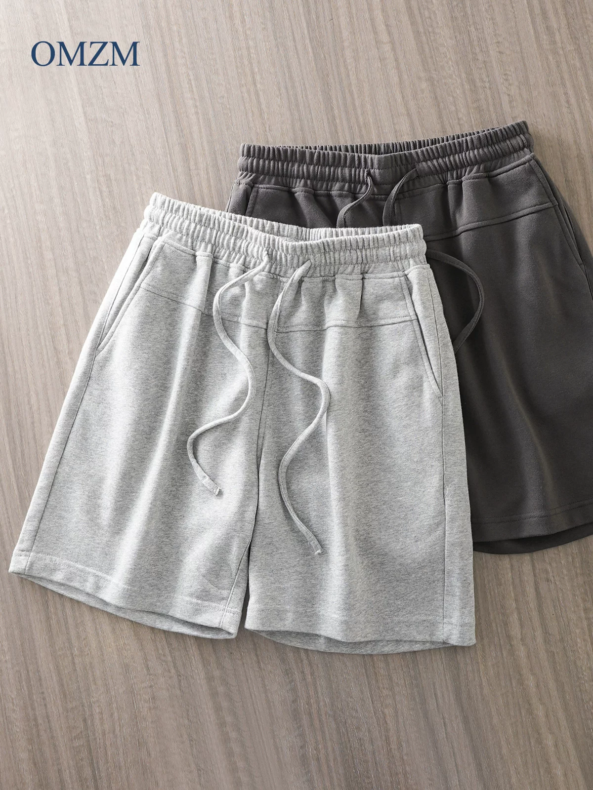 Quần short terry hạng nặng kiểu Mỹ của OMZM dành cho nam, quần thể thao mỏng thoáng khí mùa hè, quần short dài đến đầu gối màu trơn rộng rãi