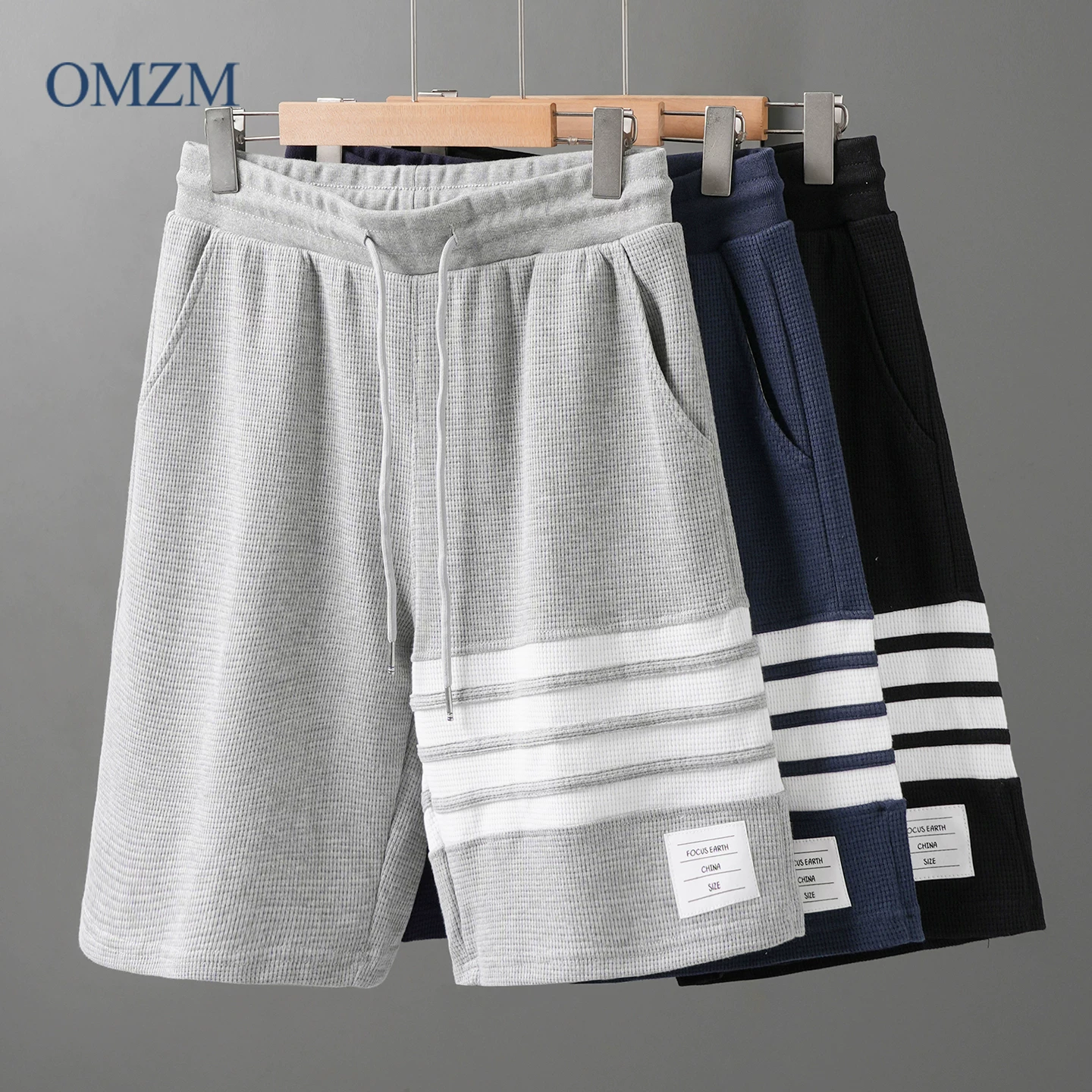 Quần short waffle kiểu Mỹ OMZM dành cho nam thể thao mùa hè quần short dài vừa phải nhanh khô quần short thể dục bốn sọc