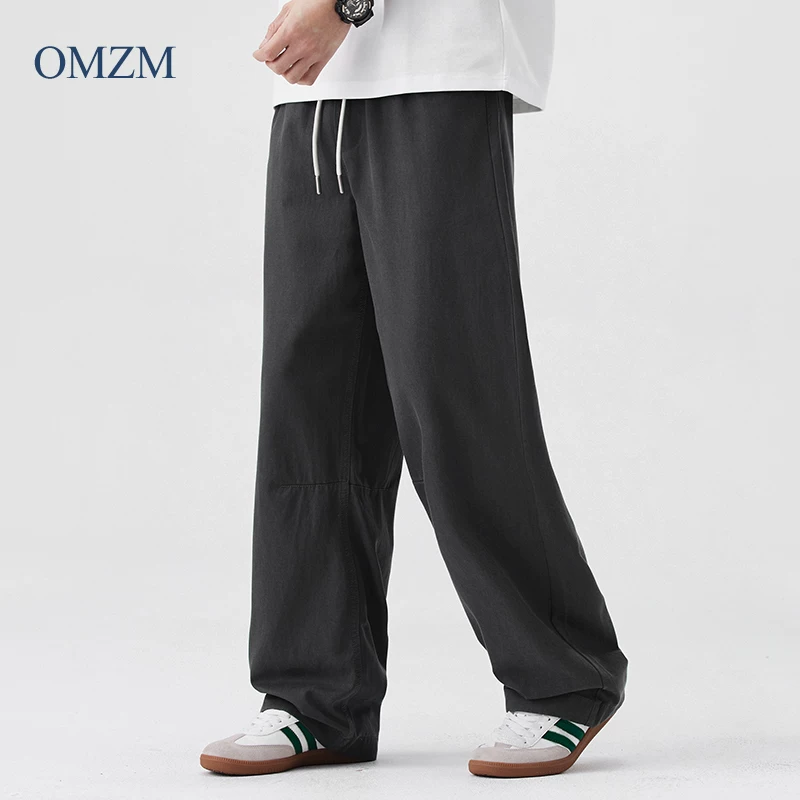 Quần âu nam chất liệu Lyocell Tencel kiểu Mỹ OMZM, mẫu mới hè 2025, dáng rộng, ống đứng, chất liệu mềm mại, thoải mái.