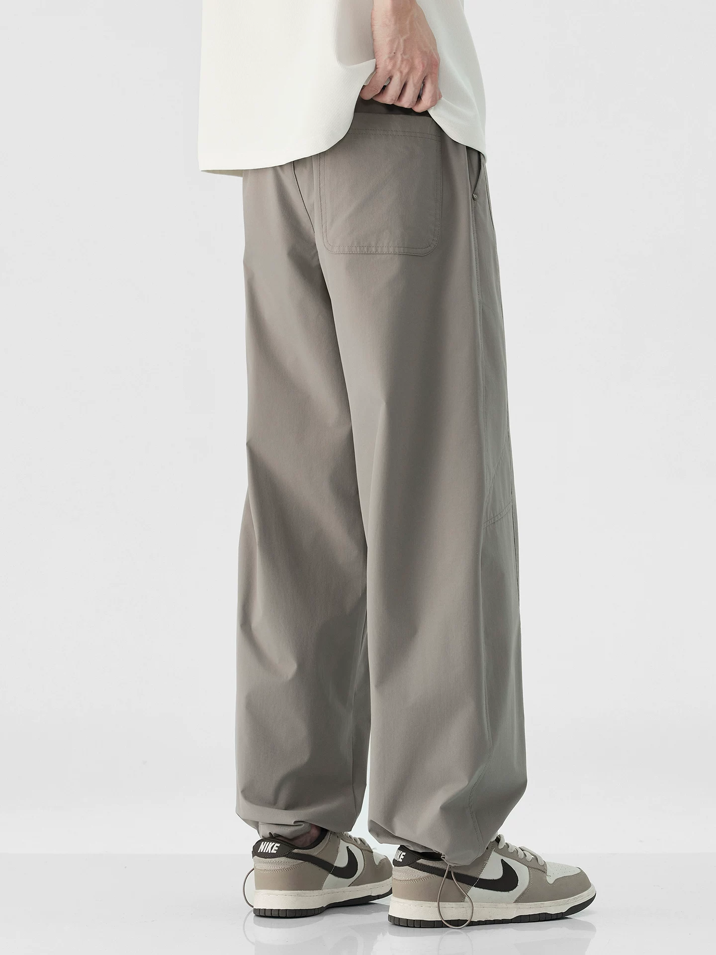 Quần công sở khô nhanh bằng lụa băng OMZM dành cho nam, quần ống rộng dáng rộng kiểu Mỹ mỏng mùa hè, quần thể thao màu trơn mát mẻ, quần thường ngày