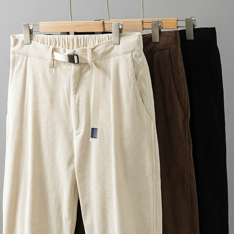 Quần kaki dày kiểu Mỹ dành cho nam, mẫu mới xuân thu 2025, dày dặn ấm áp, dáng thẳng ống côn, quần thể thao thường ngày.