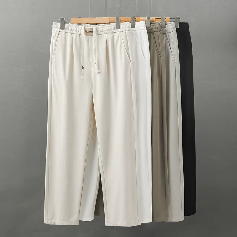 Quần âu thẳng chân kẻ sọc dọc kiểu Mỹ OMZM dành cho nam, quần thể thao dáng rộng mùa hè, quần dài thường ngày hợp thời trang