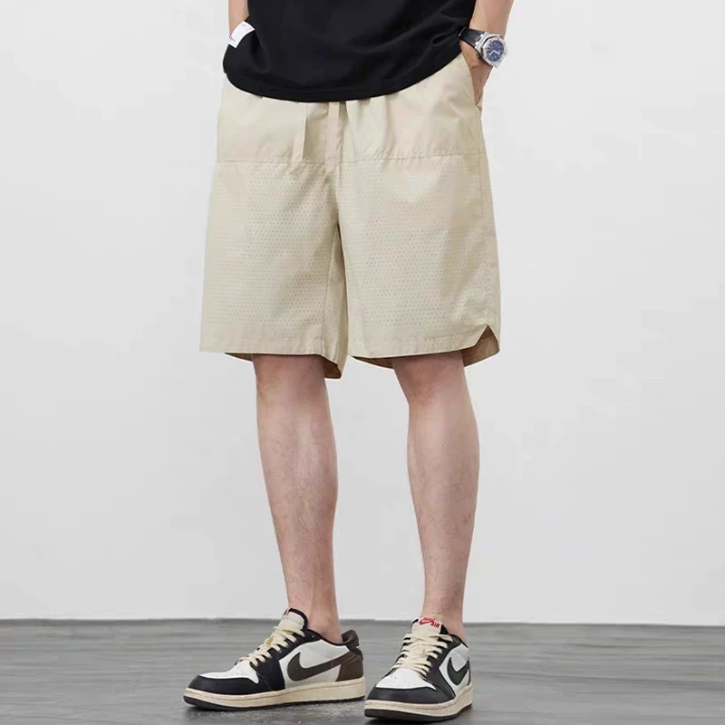 Quần short khô nhanh bằng lụa băng OMZM dành cho nam, quần short đi biển lưới mỏng thoáng khí mùa hè, quần thể thao rộng rãi kiểu Mỹ