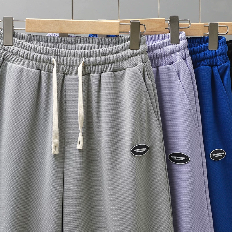 Quần short vải lụa kiểu Mỹ dành cho nam, quần thể thao chạy bộ mỏng nhanh khô mùa hè, quần short năm điểm dáng rộng, chất liệu vải waffle dệt kim, kiểu dáng thoải mái