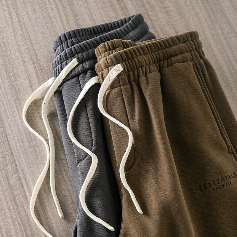 Quần jogger nam OMZM460G chất liệu nỉ dày dặn, kiểu dáng mới mùa đông 2024, quần thể thao rộng rãi, thoải mái.