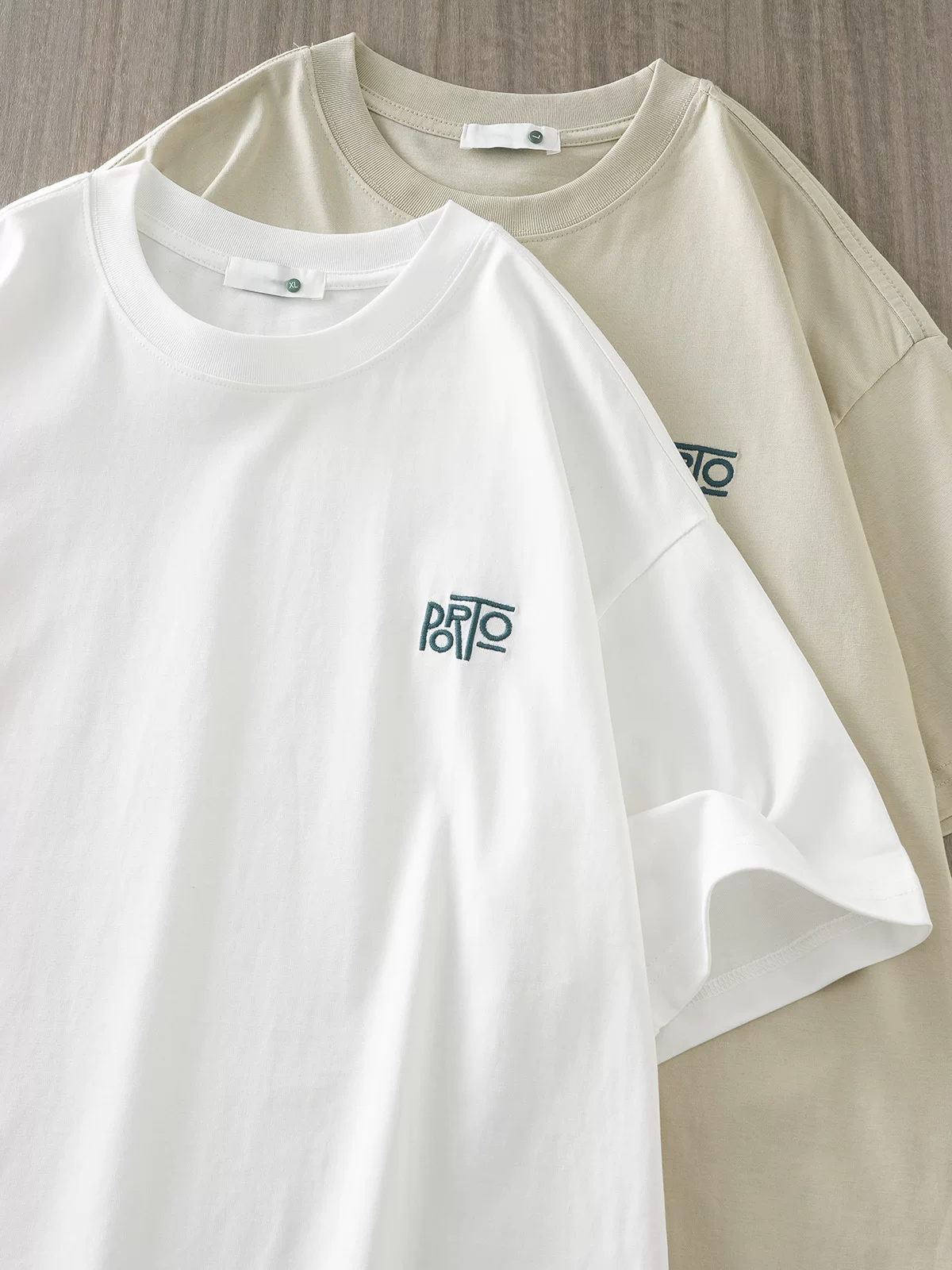 Áo thun nam OMZM kiểu Mỹ, chất liệu cotton 100% dày dặn 260g, tay ngắn, thiết kế thêu mới mùa hè 2025, dáng rộng, tay lửng.