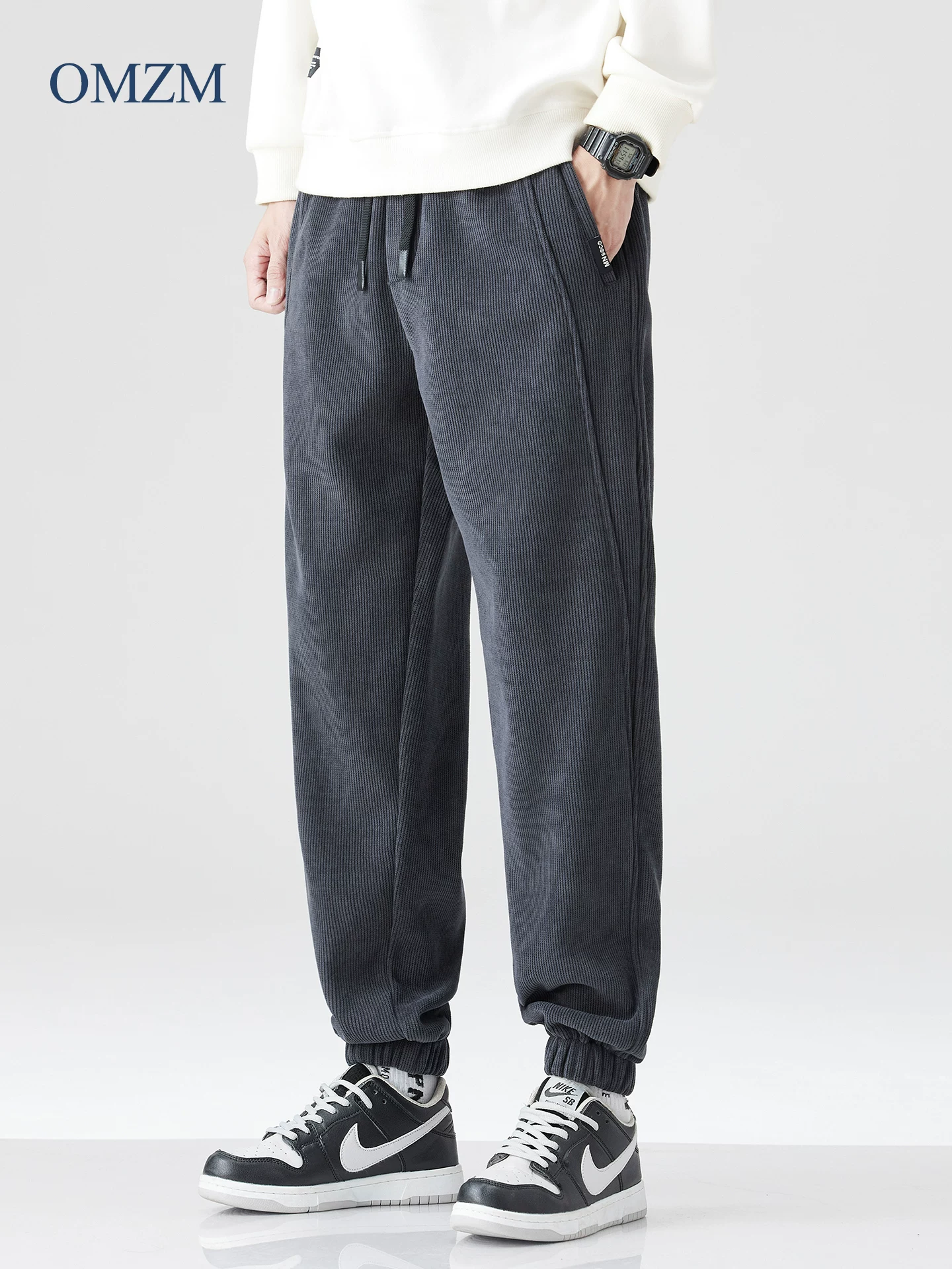 Quần thể thao bằng vải nhung có lót lông cừu hạng nặng OMZM dành cho nam, phong cách mùa thu đông, quần jogger dày dặn ấm áp kiểu Mỹ, quần thể thao rộng rãi.