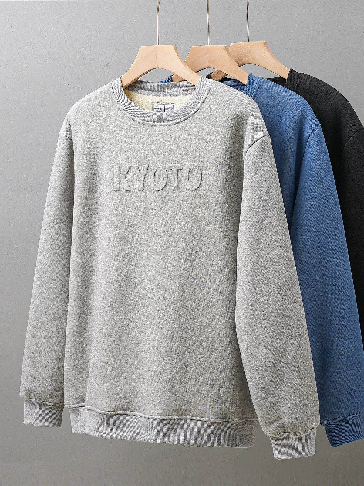 Áo len lông cừu hạng nặng OMZM500g dành cho nam, áo len cổ tròn lông cừu mùa đông mới, áo khoác lót lông cừu và dày dặn, hợp thời trang.