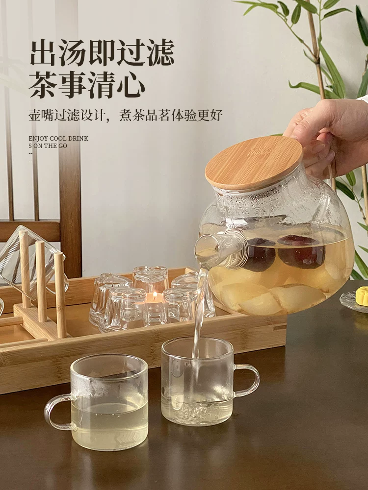 Bộ dụng cụ pha trà với ấm trà thủy tinh borosilicate cao cấp dùng được trên lửa trần, chén trà hoa, ấm pha trà, ấm đun nước, và bếp than.