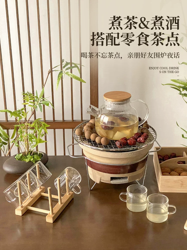 Bộ dụng cụ pha trà với ấm trà thủy tinh borosilicate cao cấp dùng được trên lửa trần, chén trà hoa, ấm pha trà, ấm đun nước, và bếp than.