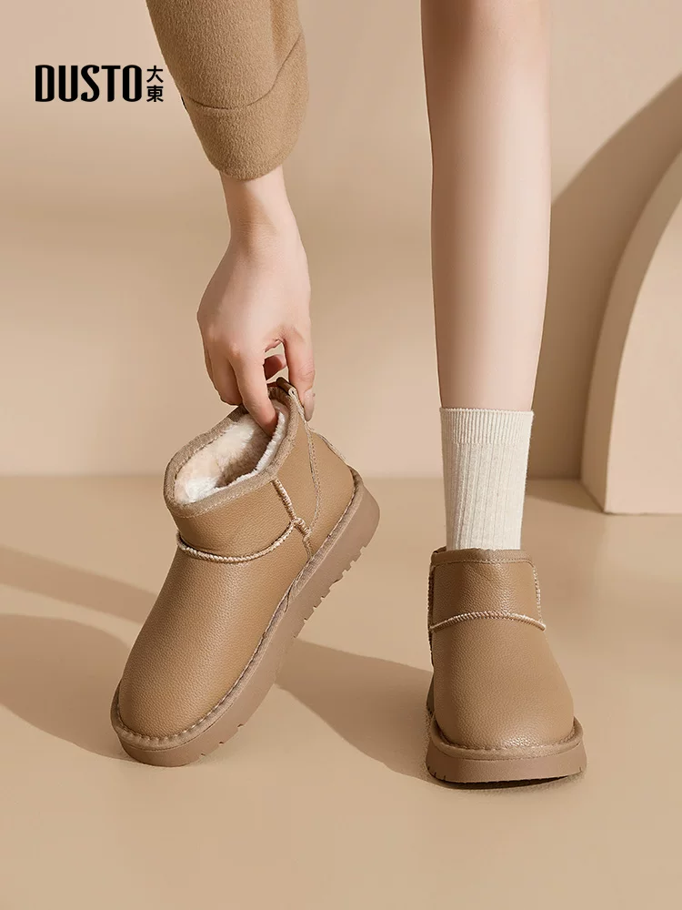 Giày bốt tuyết chống thấm nước và chống trơn trượt Dadong dành cho nữ, kiểu dáng mùa đông mới 2025, lót lông cừu và dày dặn, giày bệt đế dày giữ ấm bằng cotton.