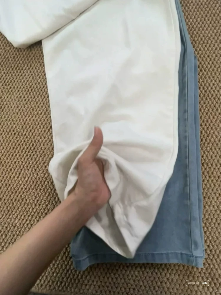 Quần jeans Tencel trắng nữ, hè 2025, kiểu dáng mỏng, size lớn, cạp cao, chất liệu mềm mại, tôn dáng, quần ống rộng chất liệu lụa đá