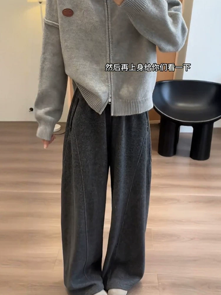 Quần âu nữ ống rộng màu xám, dáng suông, chất liệu len, lót lông cừu, dày dặn, cạp cao, mềm mại, phù hợp với dáng người quả lê, size lớn, mùa đông.