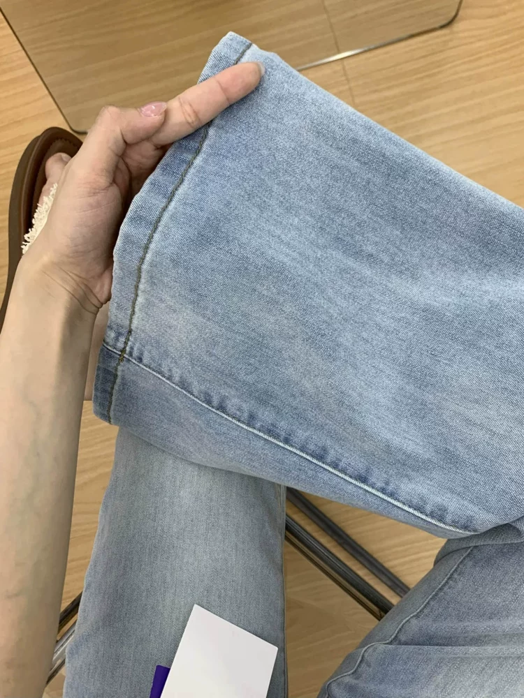 Quần jean nữ màu sáng, không bó sát, hơi loe, kiểu dáng mùa hè mỏng nhẹ, size lớn, cạp cao, rộng rãi, tôn dáng, quần dài loe chất liệu Tencel.