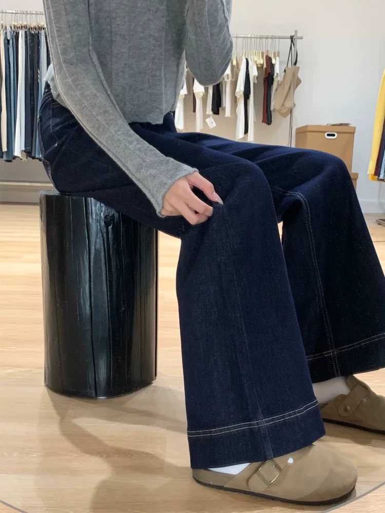 Quần jeans xanh denim dáng loe nữ xuân 2025 kiểu mới, size lớn, cạp cao, che hông, chất liệu mềm mại, tôn dáng, kiểu chuông