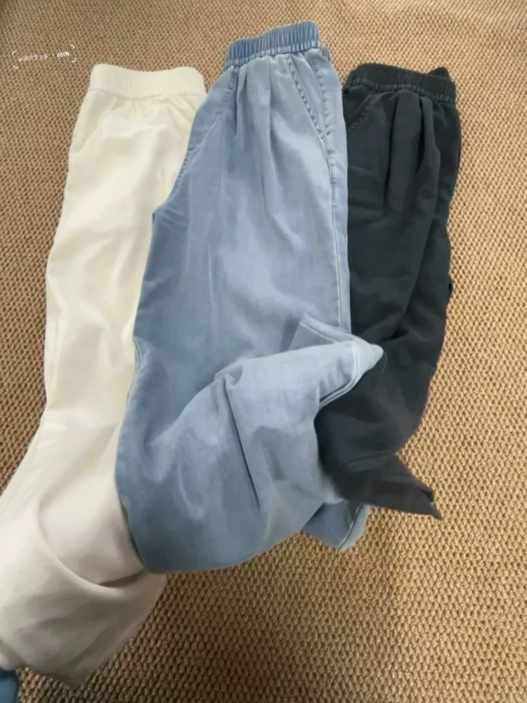 Quần jeans Tencel trắng nữ, hè 2025, kiểu dáng mỏng, size lớn, cạp cao, chất liệu mềm mại, tôn dáng, quần ống rộng chất liệu lụa đá