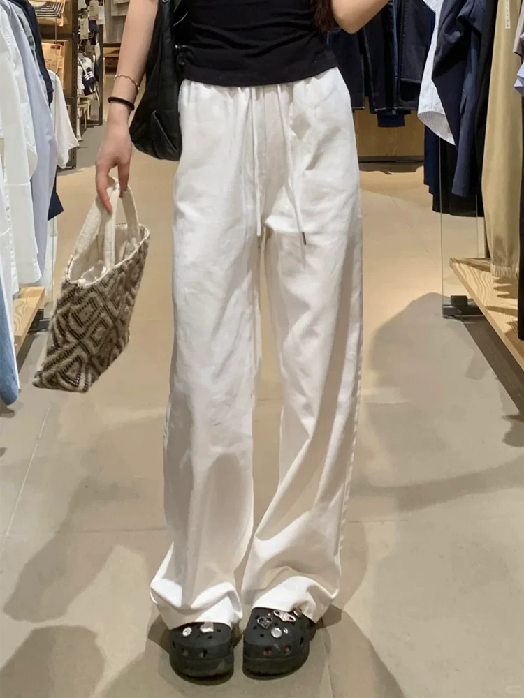 Quần thể thao màu trắng dành cho nữ, kiểu dáng mỏng mùa hè, cỡ lớn, lưng cao, dáng rộng, giảm béo, dáng quả lê, quần dài ống rộng.