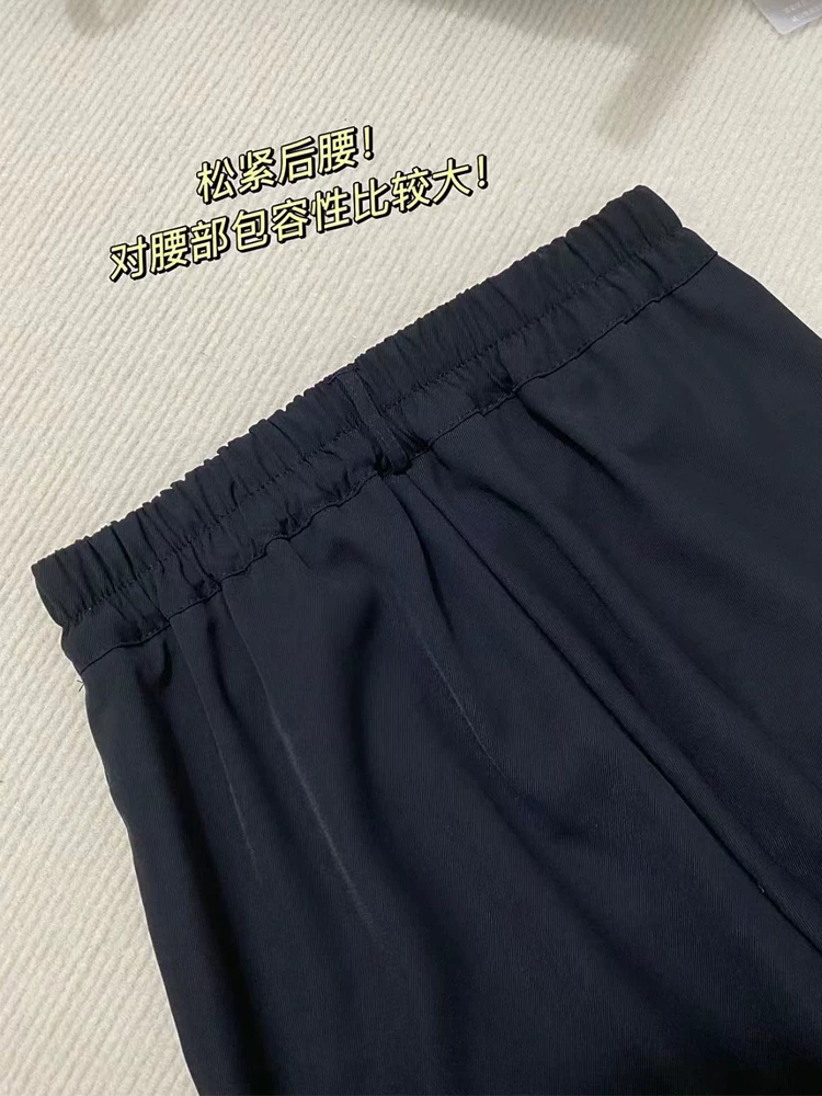 Quần tây đen dành cho nữ, mùa hè, cỡ lớn, lưng cao, dáng rộng, tôn dáng, dáng quả lê, phong cách đầu thu, quần ống rộng thường ngày.