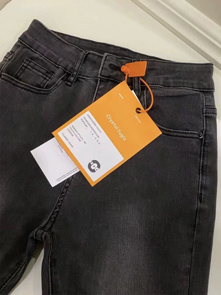 Quần jean xòe viền xù màu đen và xám dành cho nữ, kiểu dáng mùa thu mới, cỡ lớn, lưng cao, che hông, giảm béo, quần ống loe thẳng.