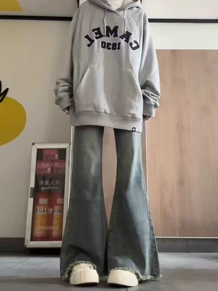 Quần jeans loe nữ, xuân 2025, size lớn, cạp cao, dáng rộng, che hông, tôn dáng, ống chuông, dài chạm sàn