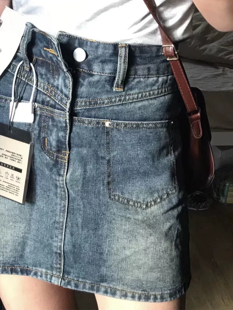 Váy ngắn denim màu xanh cổ điển hình quả lê dành cho nữ, kiểu dáng mỏng mùa hè, cỡ lớn, eo cao, che hông, váy chữ A thon gọn.