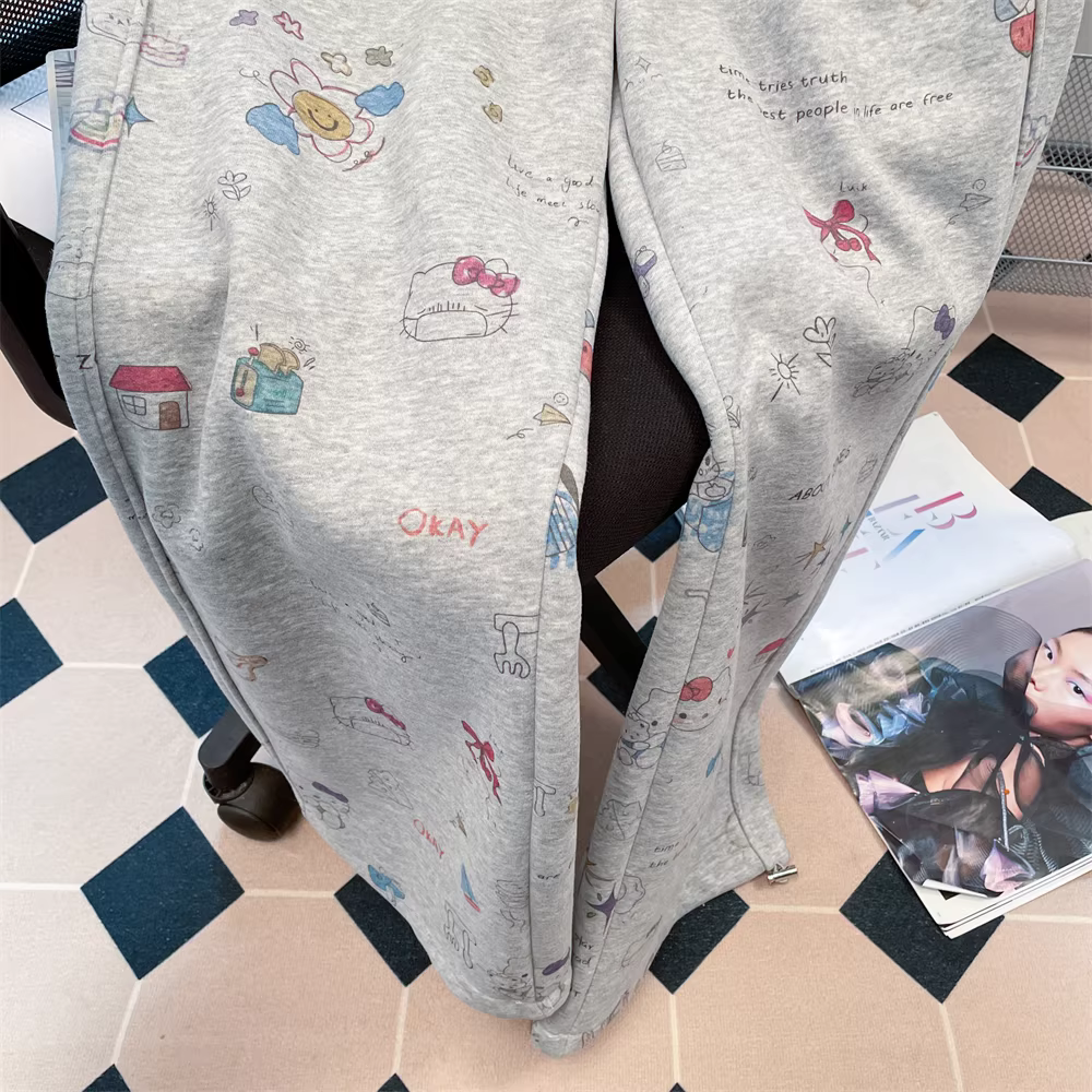 Quần thể thao dày có lót lông cừu phong cách retro graffiti của Hàn Quốc dành cho nữ, quần ống rộng có dây rút cao cấp mùa thu đông