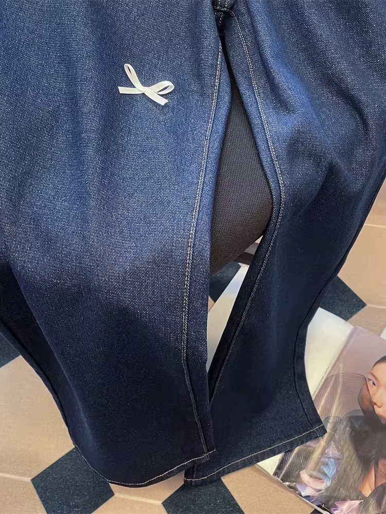 Quần jeans nữ phối ren nơ ngọc trai kiểu retro, dáng rộng ống đứng, tôn dáng, xu hướng xuân 2025