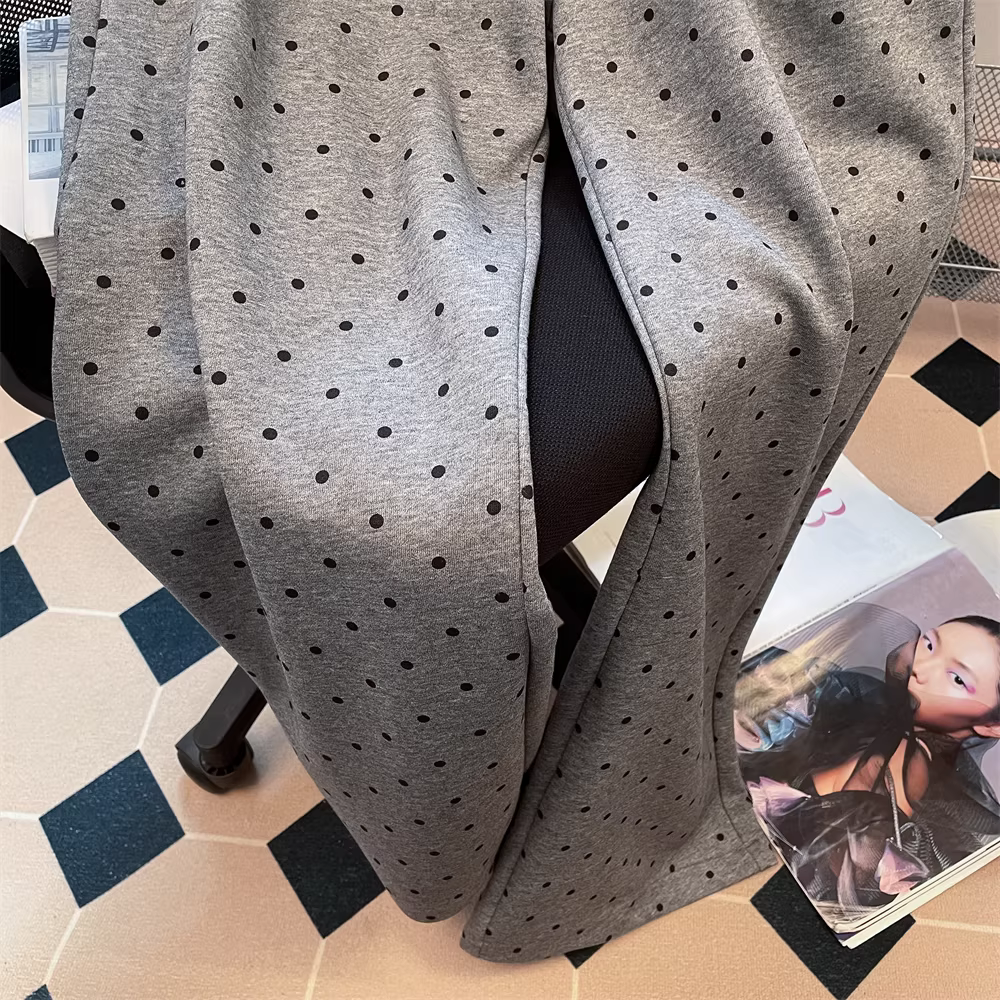 Quần ống rộng chấm bi phối ren phong cách Hàn Quốc dành cho nữ, với thiết kế độc đáo, quần ống đứng thoải mái và giản dị.