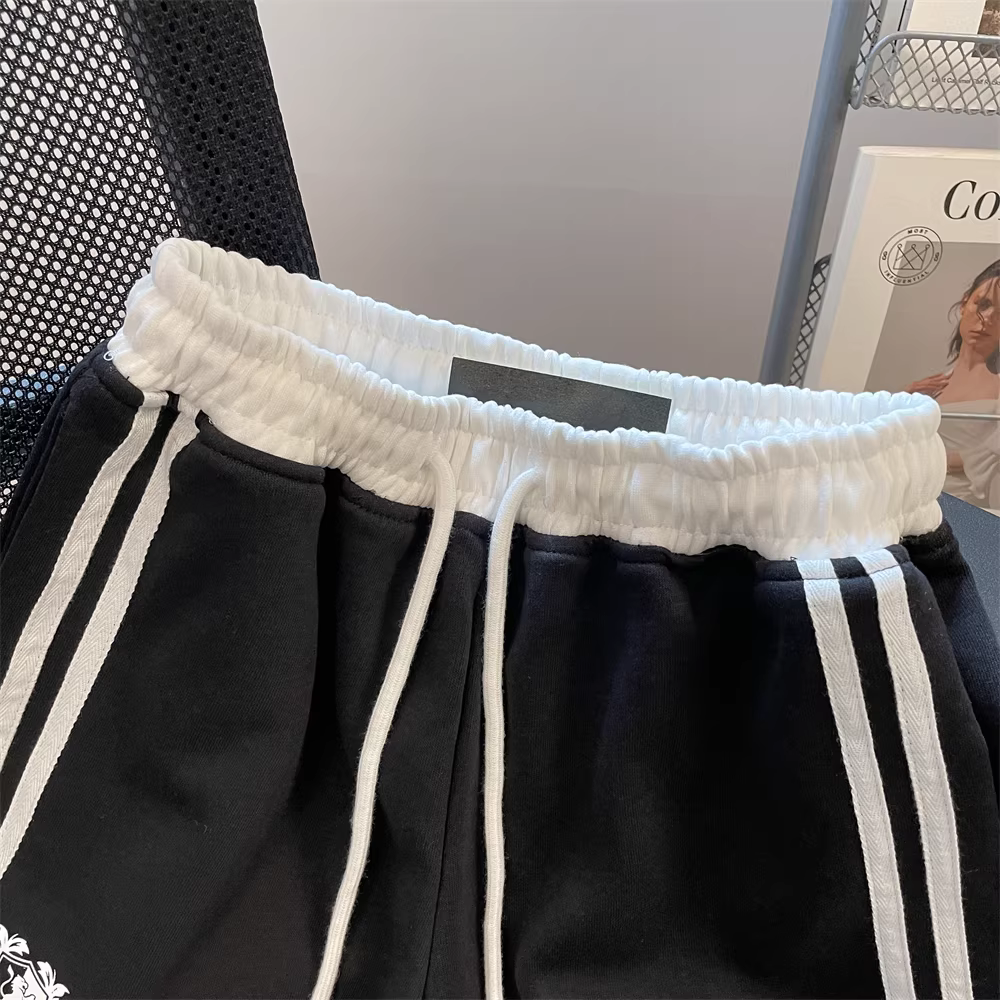 Quần short dáng chữ A dáng rộng thể thao thông thường kiểu Mỹ dành cho nữ, đa năng và rộng rãi cho mùa hè, phong cách lười biếng, thích hợp để mặc bên ngoài, quần short dài ba phần tư.