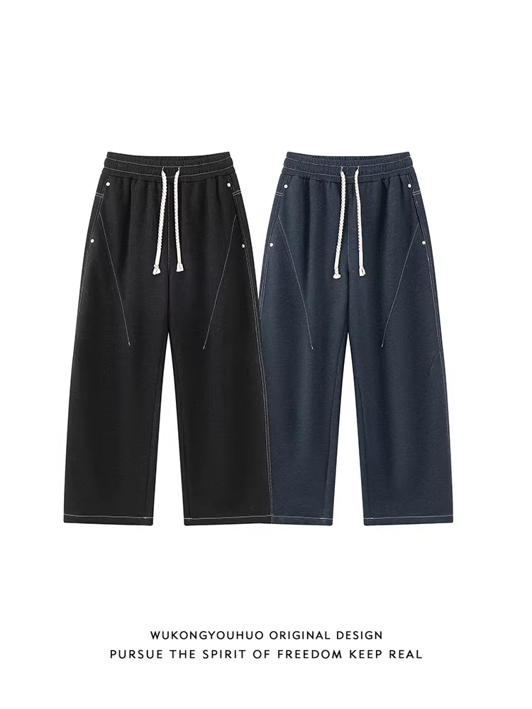 Ngộ Không có sẵn quần âu nam ống đứng phong cách retro phối màu thời thượng, quần ống rộng lưng thun dây rút thoải mái.