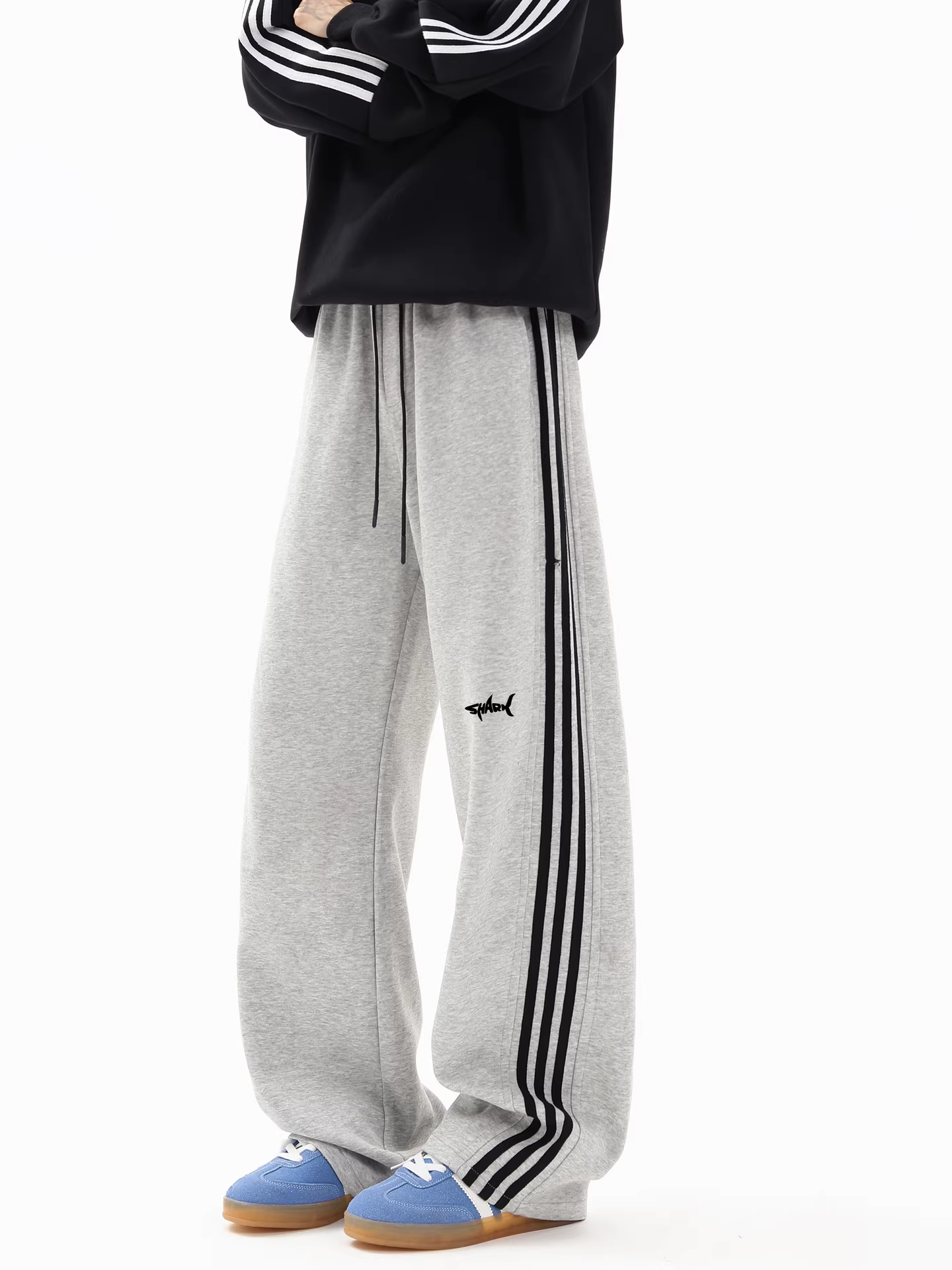 Wukong có sẵn quần thể thao nam kiểu Mỹ sọc thẳng, dáng suông, chất liệu mềm mại, quần dài rộng rãi, đa năng, phong cách thường ngày.