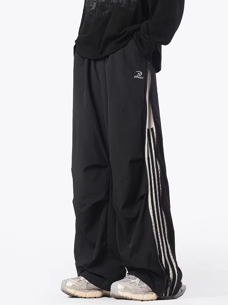 Ngộ Không có sẵn quần dù kẻ sọc kiểu Mỹ thời thượng dành cho nam, quần dài rộng ống rộng đa năng phong cách cổ điển.