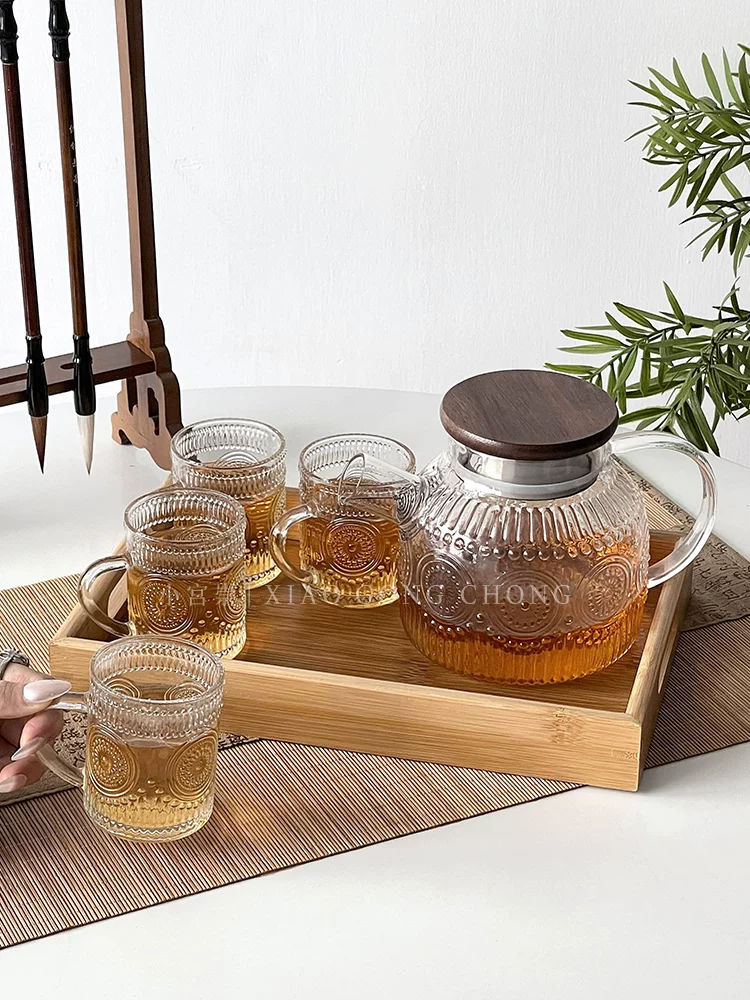 Bộ ấm trà và bộ trà Trung Quốc có vẻ ngoài thẩm mỹ cao, cốc nước thủy tinh hình hoa hướng dương, bình nước lạnh chịu nhiệt cao gia dụng, bình giữ nhiệt.