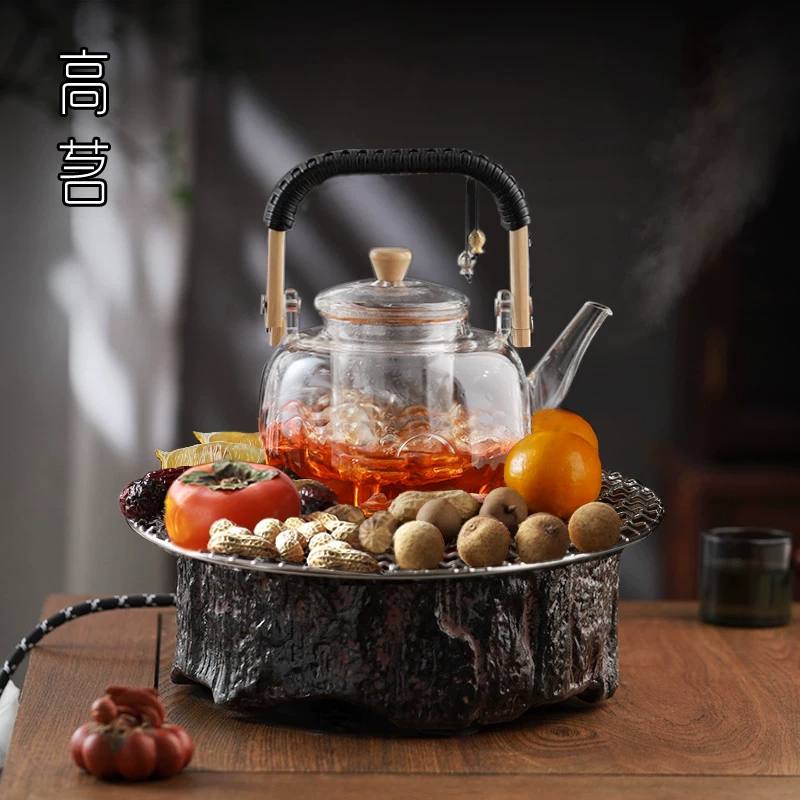 Bộ dụng cụ pha trà hoàn chỉnh xung quanh bếp, máy pha trà bằng bếp điện gốm sứ kiểu Trung Quốc, pha trà và rang trà trong nhà, ấm trà thủy tinh gia dụng.