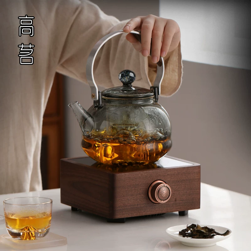 Ấm trà thủy tinh cao cấp hình bầu trời đầy sao với hệ thống nấu và pha trà tích hợp phun hơi nước, bếp điện gốm chuyên dụng, chịu nhiệt.