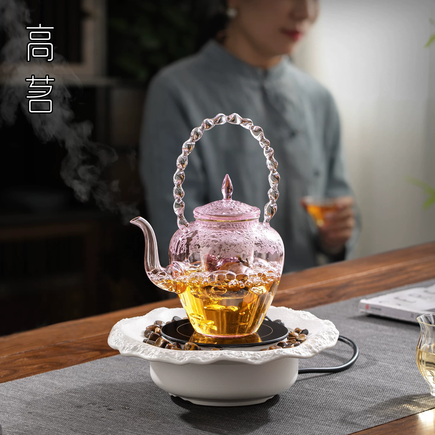 Ấm trà mẫu mới 2025 tích hợp bộ lọc, bếp điện gốm chuyên dụng pha trà dành cho nữ, ấm trà thủy tinh trắng, ấm đun nước dùng trong gia đình.