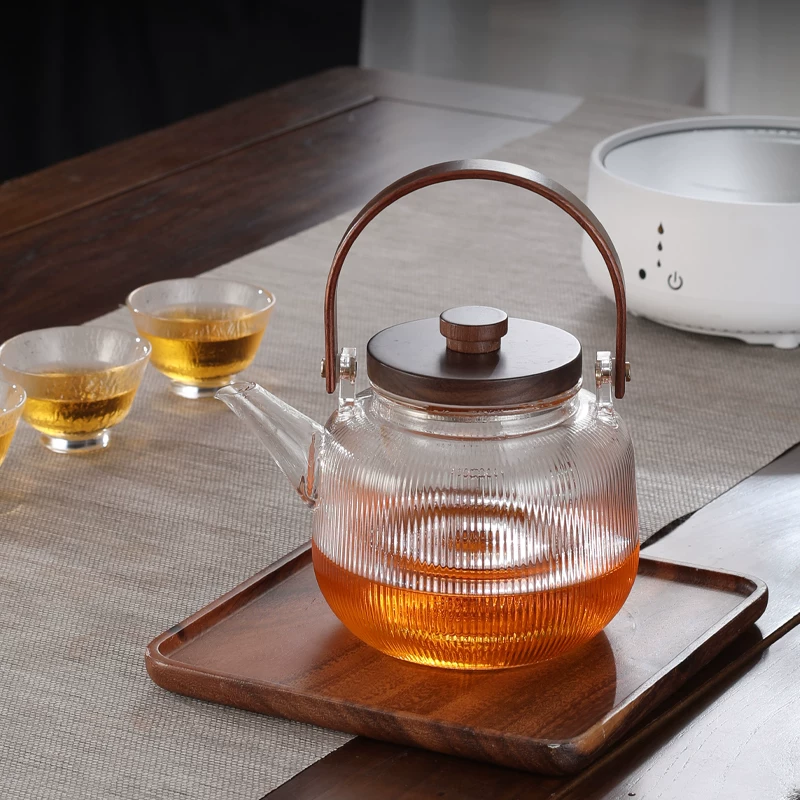 Ấm trà thủy tinh borosilicate cao cấp, chịu nhiệt cao, dung tích lớn 1L, tích hợp chức năng hấp và đun sôi, tách trà nước.