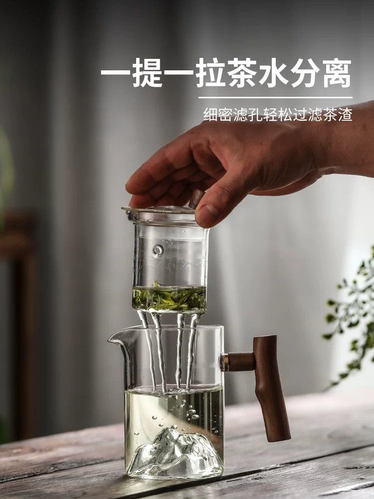 Ấm trà văn phòng màu xanh lá cây có tay cầm bằng gỗ, ấm trà có ngăn tách nước trà, ấm trà thủy tinh chịu nhiệt cao một mảnh có tầm nhìn ra núi có tay cầm bằng gỗ.