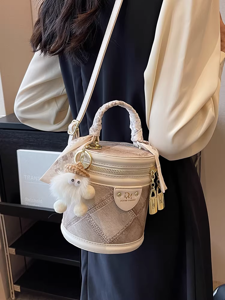 Túi xách nữ độc đáo 2025 thu đông mới, tinh tế và thời trang, túi đeo chéo cao cấp, túi xách tay hình trụ