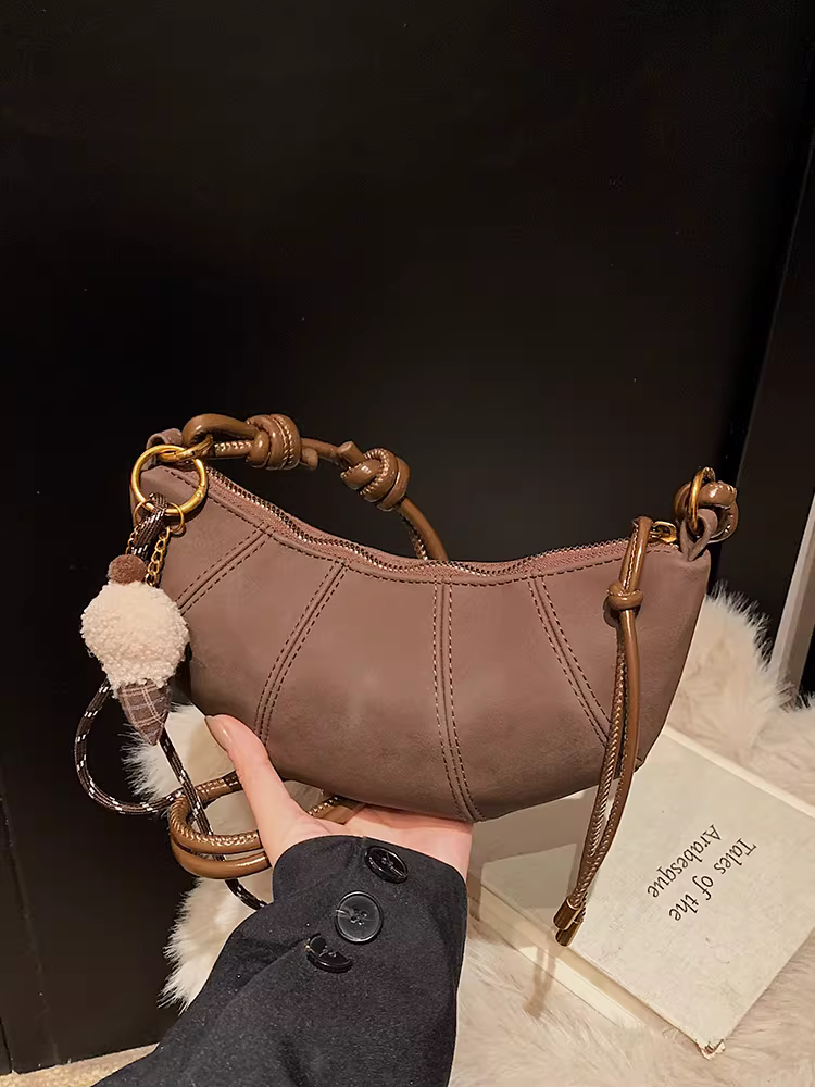 Túi xách cao cấp dành cho nữ, phong cách retro thu đông 2025, túi đeo chéo thời trang mới, túi bánh bao đi làm nữ.