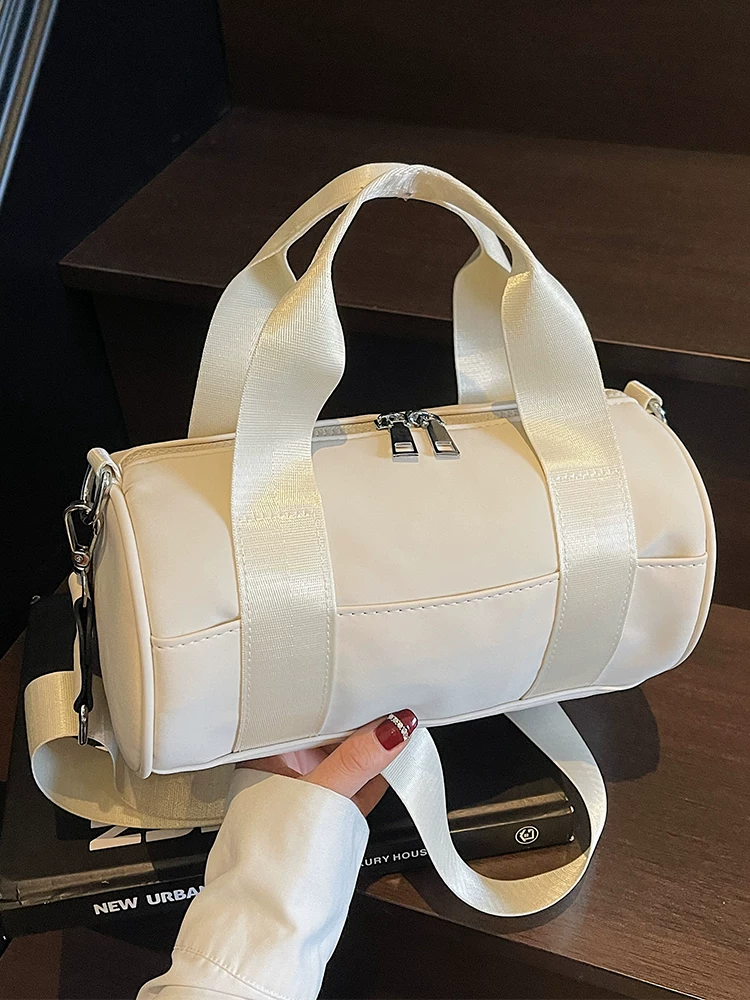 Túi vải canvas nữ, dung tích lớn, thiết kế độc đáo mùa hè 2025, túi đeo chéo quai rộng, túi hình trụ thời trang cao cấp.