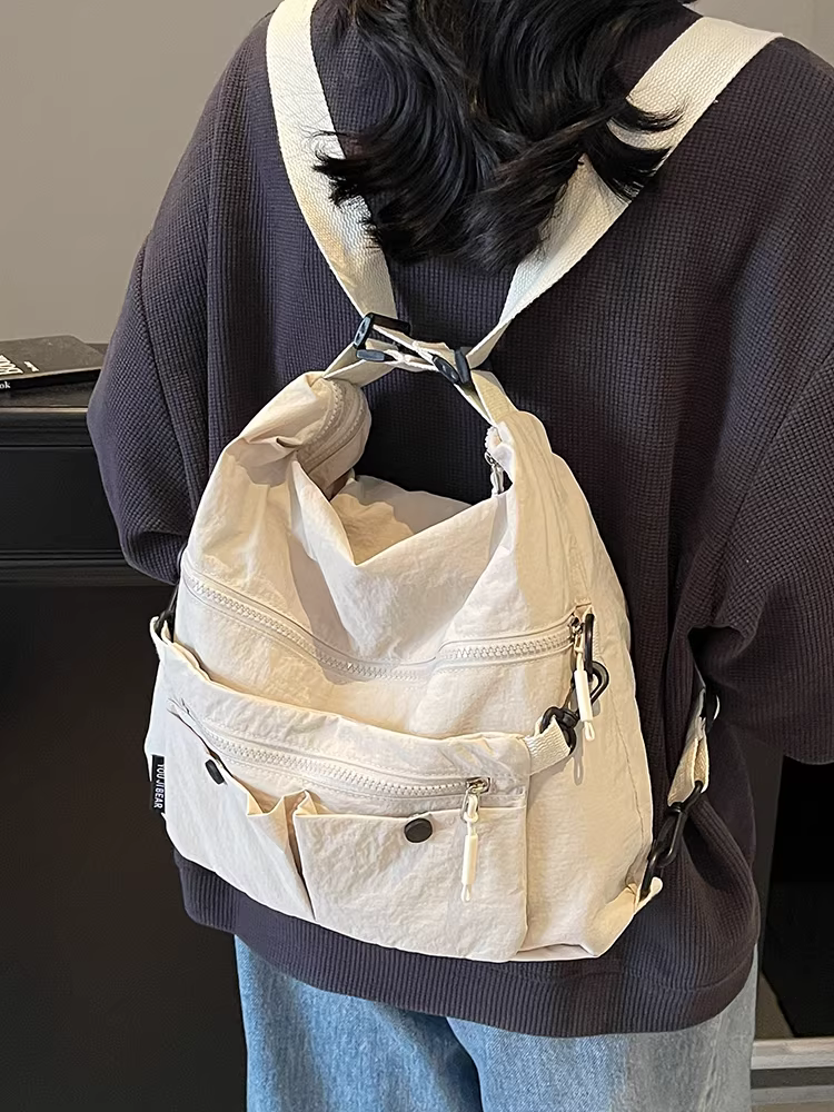 Túi vải canvas dành cho nữ, sức chứa lớn, túi đeo chéo vai mùa hè mới 2025, ba lô đi làm đa năng phong cách Hàn Quốc giản dị